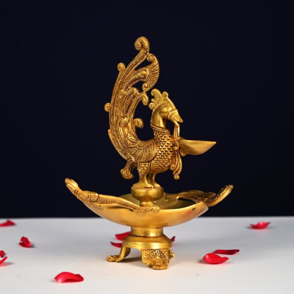 Brass urli with peacock diya height 11 inch