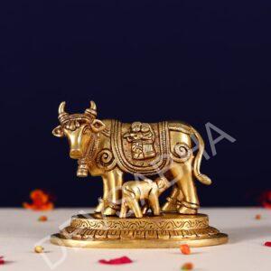 brass kamdhenu carving with radha krishna