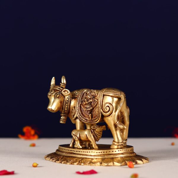 Brass kamdhenu carving with krishna and peacock Height 4 Inch