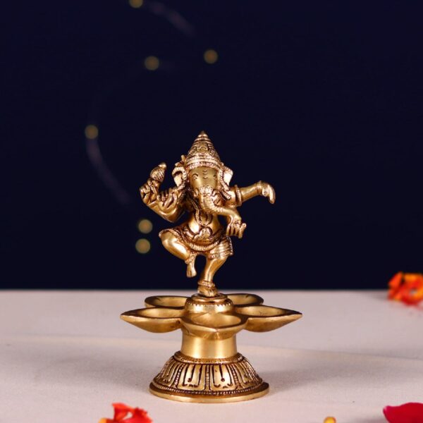 Brass five petal diya with dancing ganesh