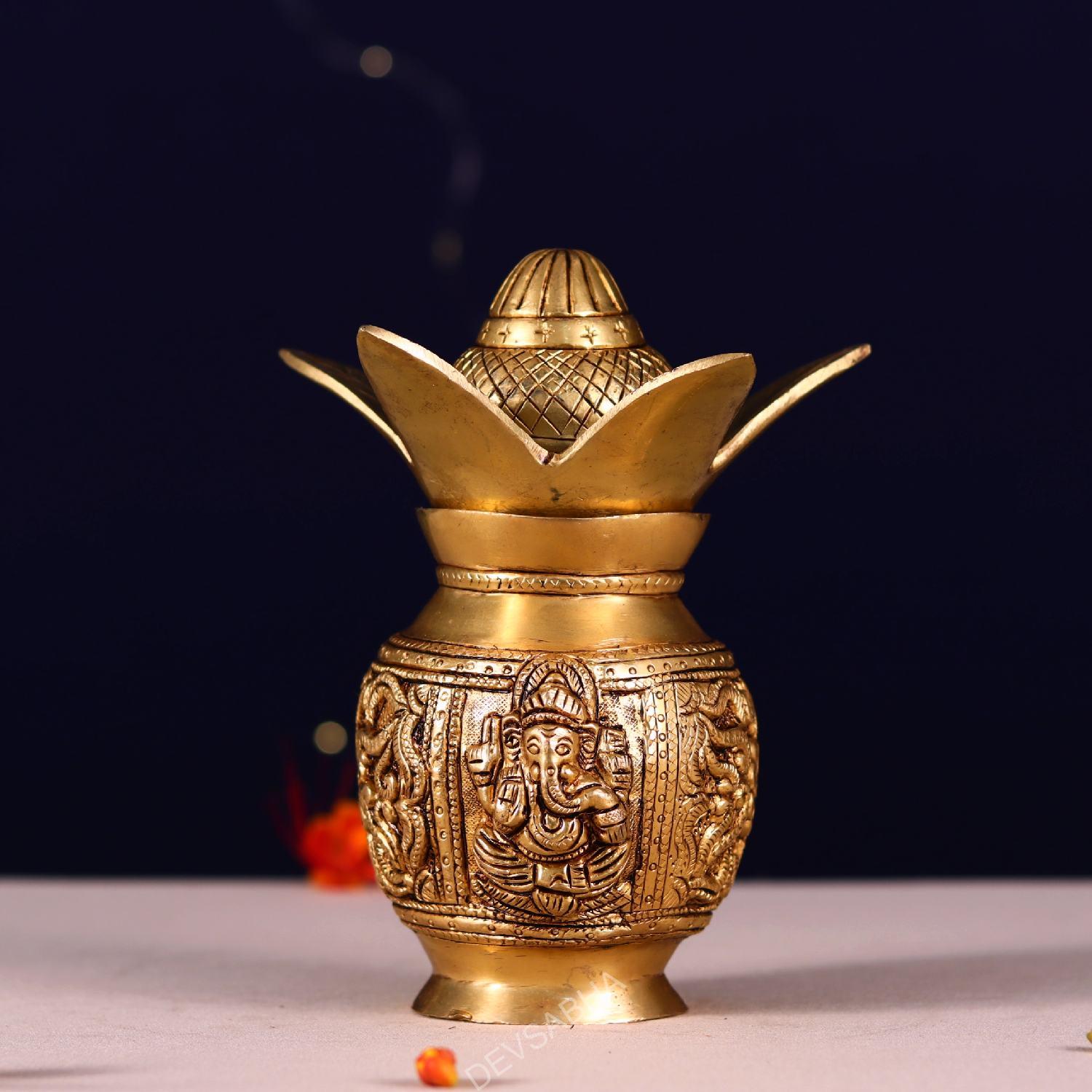 brass kalash with ganesh and lakshmi carving