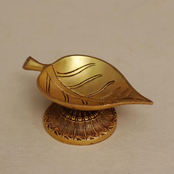 brass oil diya in leaf shape height 2.5 inch