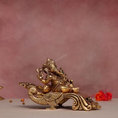Brass Sofa Ganesha- Lord Ganesha Resting On Peacock Couch