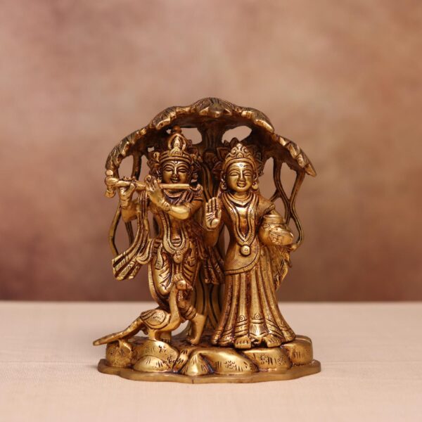 Brass Radha Krishna idol with tree and peacock  7.4 inches