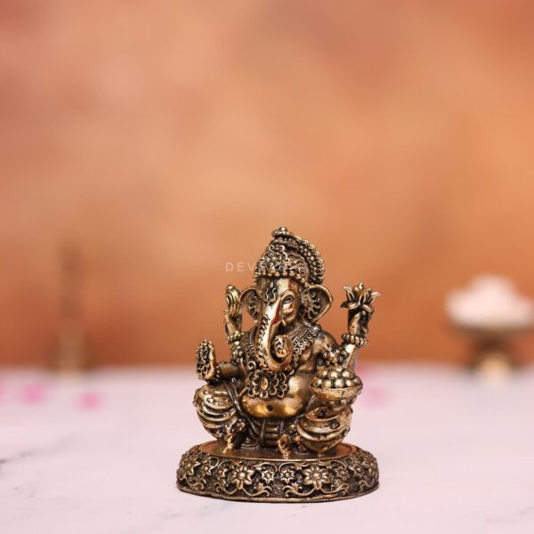Brass ganesh idol height 2.9 inches
