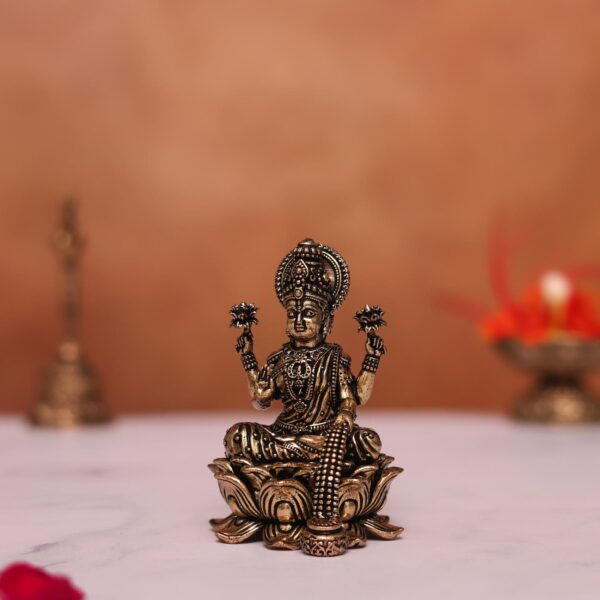 Brass laxmi idol height 3 inches