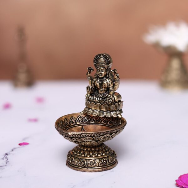 Brass lakshmi diya height 3.7 inches