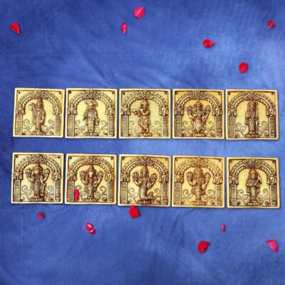 Intricate carvings depict deities against a textured backdrop in this brass wall hanging Dashavatar idol.