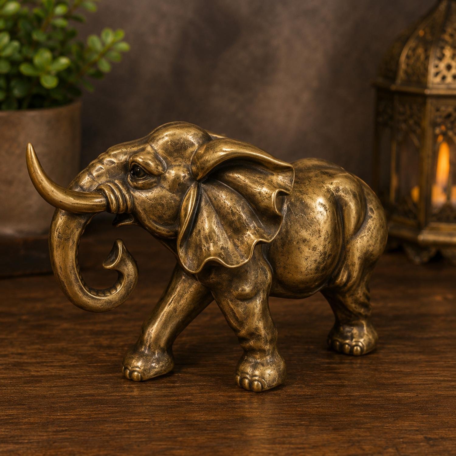 Bronze polished elephant figurine on table