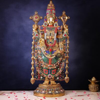 Front view of colorful brass Venkateswara Swamy idol adorned with intricate stonework and vibrant patterns