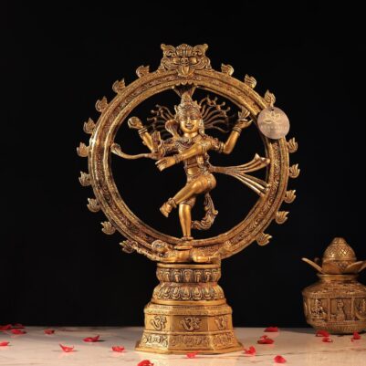 Front view of intricate golden brass nataraj statue dancing within decorative circular frame