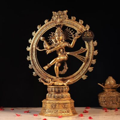 Intricate flame motifs carved on the circular frame of the brass nataraj statue standing gracefully on lotus pedestal.