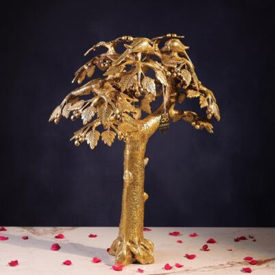 Front view of brass large tree sculpture with detailed leaves, berries, and perched birds on branches