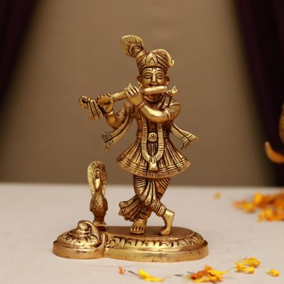 brass krishna with peacock