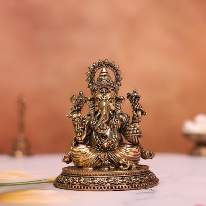 brass ganesh idol sitting