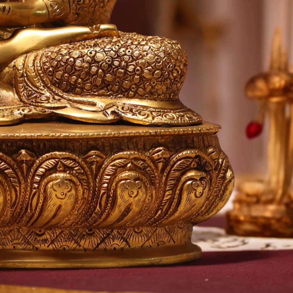 a gold statue on a table